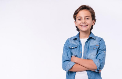  boy in casual outfit with arms crossed